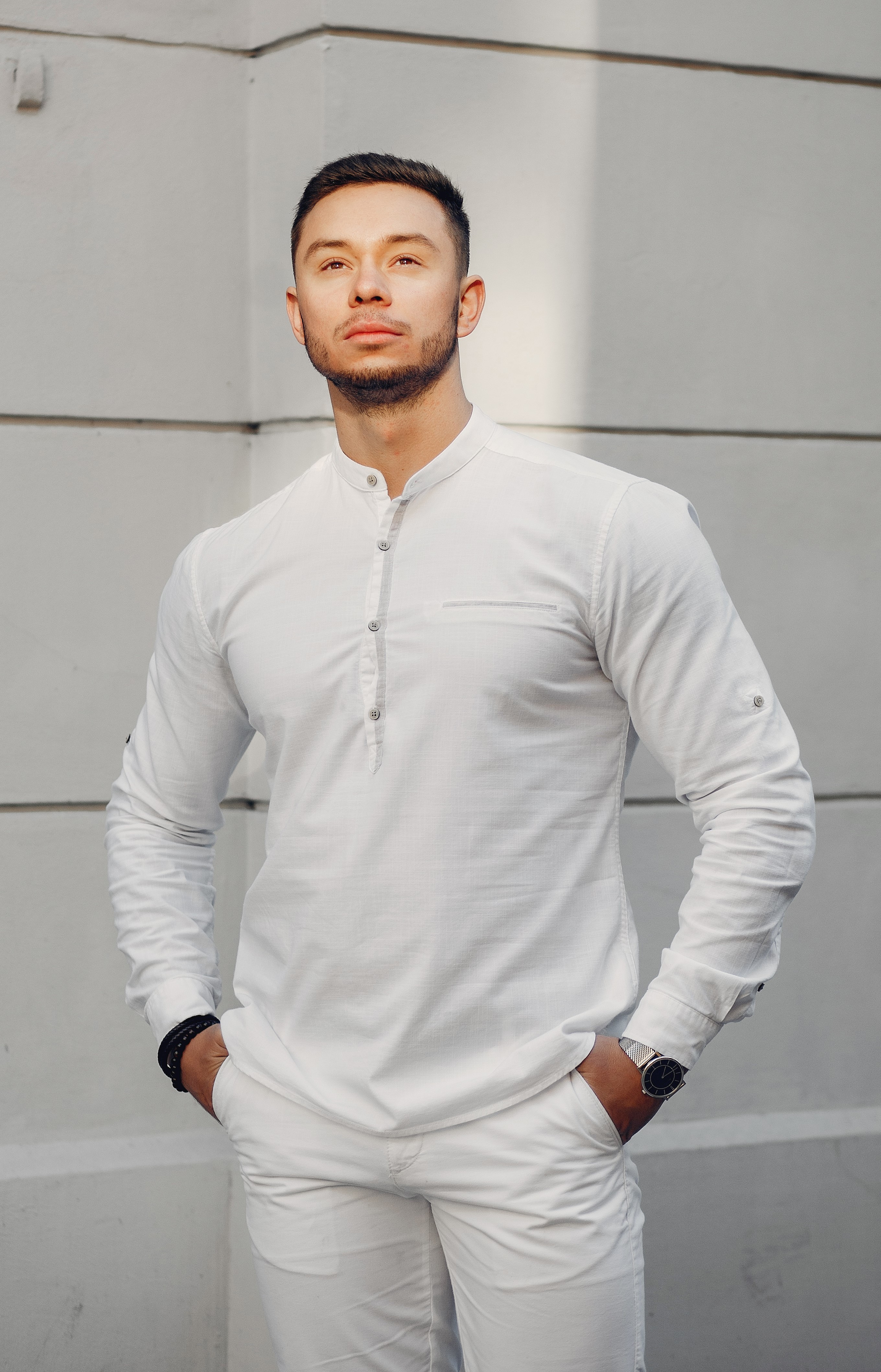 Handsome businesman in a summer city